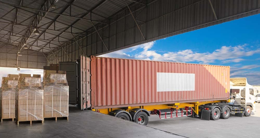 Industrial cargo and heavy equipment prepared for factory relocation